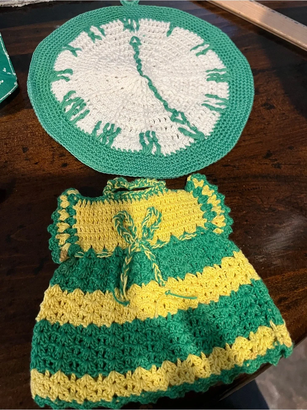 Handmade Green and Yellow Crochet Kitchen Dress Pot Holder and a clock crocheted